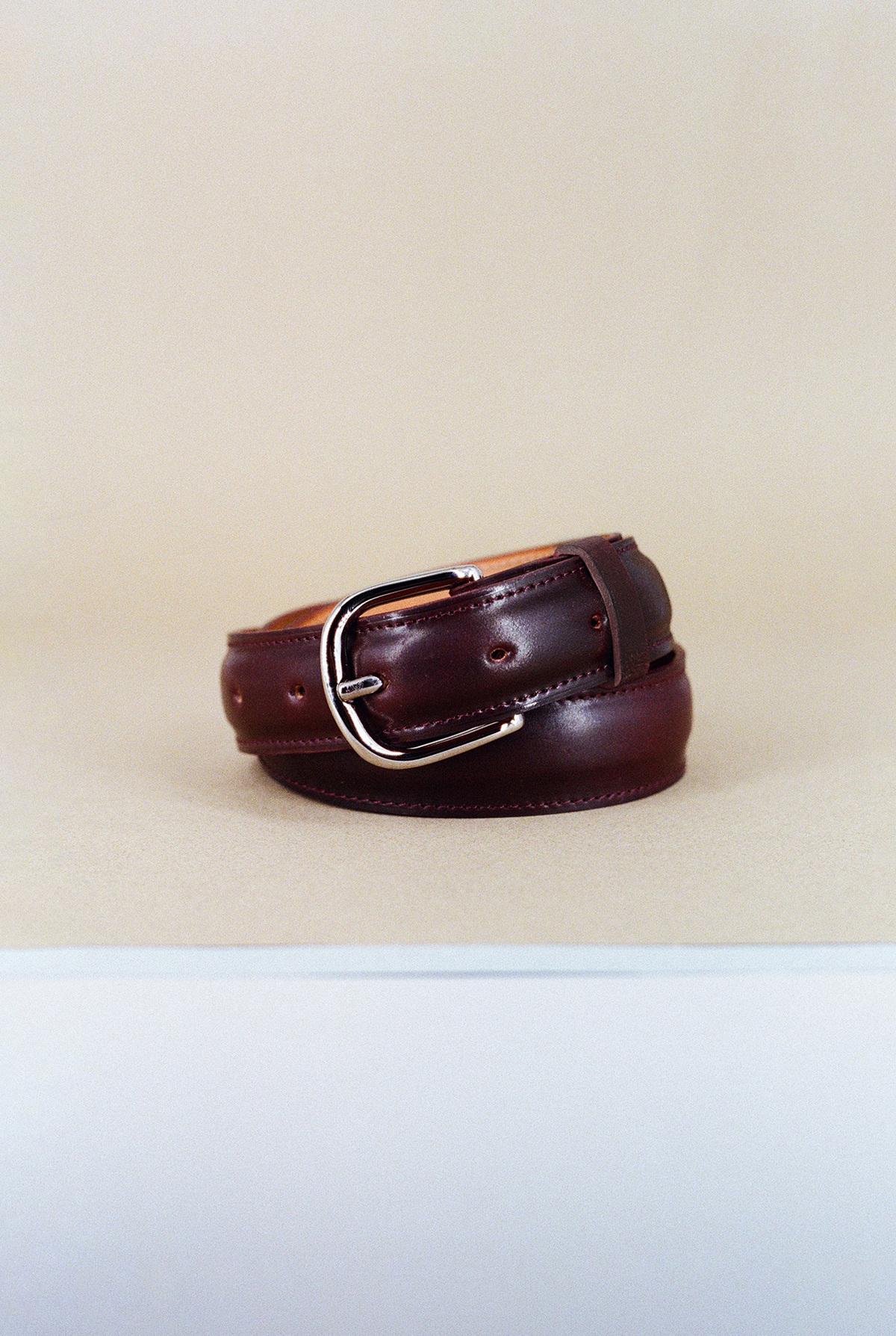 Burgundy Cordovan and silver buckle formal belt